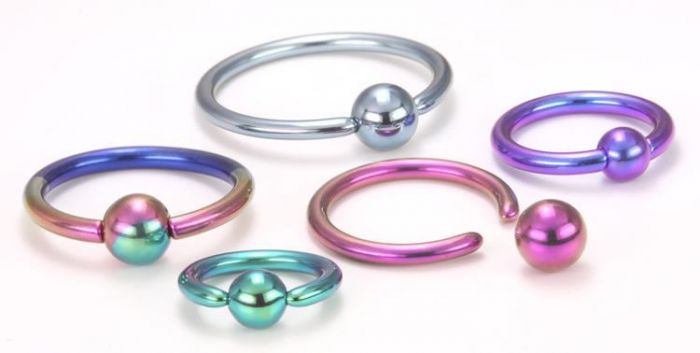 Display of anodized titanium captive bead rings