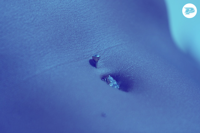 Pierced navel ring with PainfulPleasures blue overlay