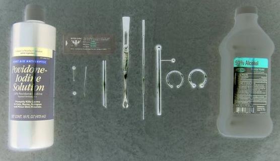 Setup a Sterile Field Containing All Sterile Tools, Medical Supplies & Jewelry Before Performing a Piercing