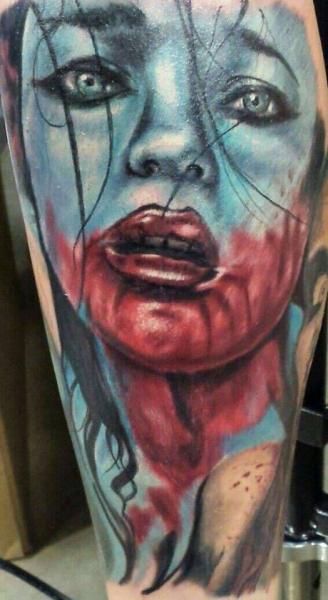 Woman With a Gun Tattoo