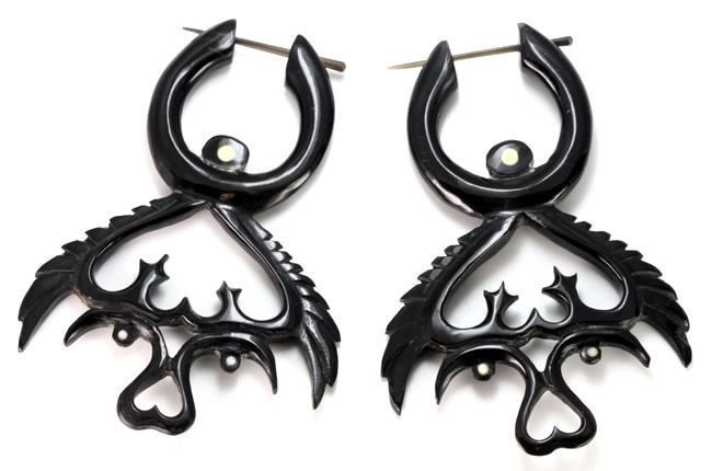 One pair of black horn earrings with picks