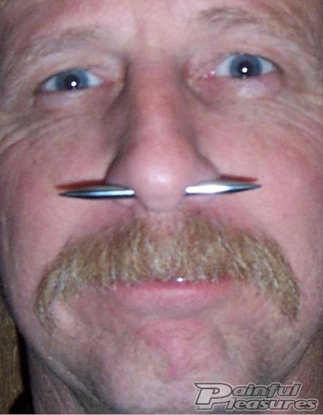 Middle-Aged Man With Septum Piercing