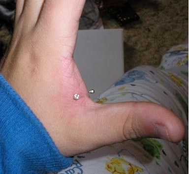Jeweled Hand Web Piercing