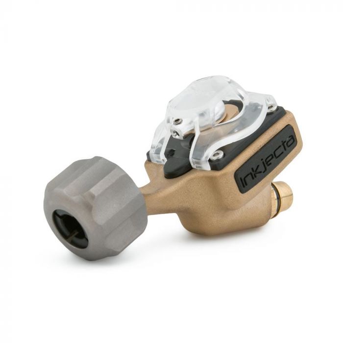 Brass Inkjecta tattoo machine on a white backdrop