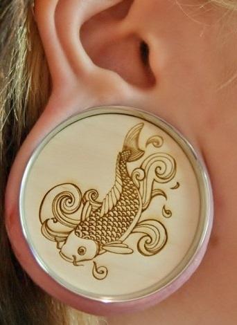 Stretched Lobe with Custom Engraved Limitless Plug Featuring a Fish