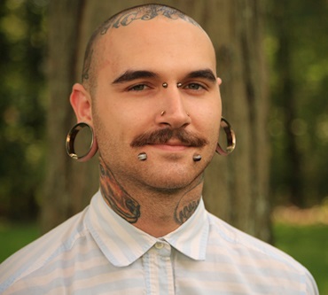 Pierced and Tattooed Man