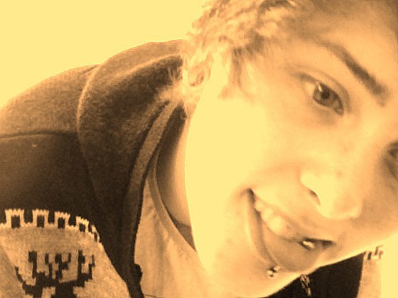 Teenage Boy With Pierced Tongue