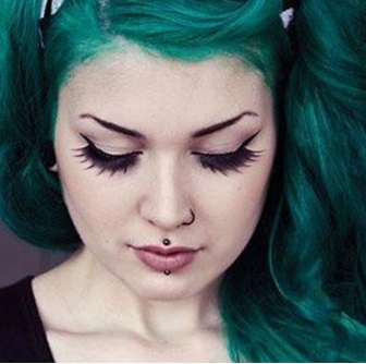 Woman With Cyber Bites Lip Piercings 