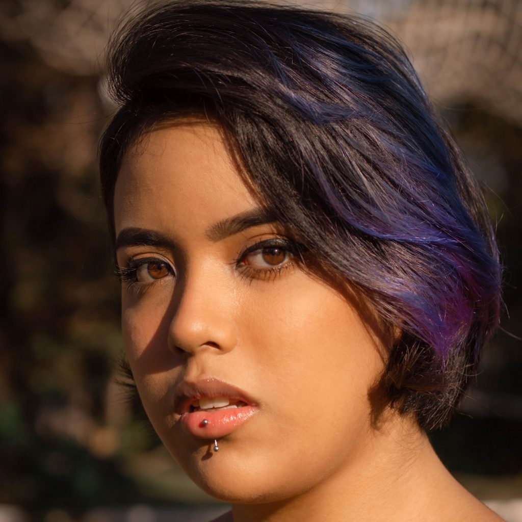 Close-up of girl with lip piercing