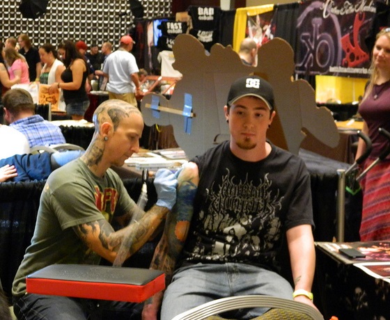 Dan Henk Tattooing at a Convention 