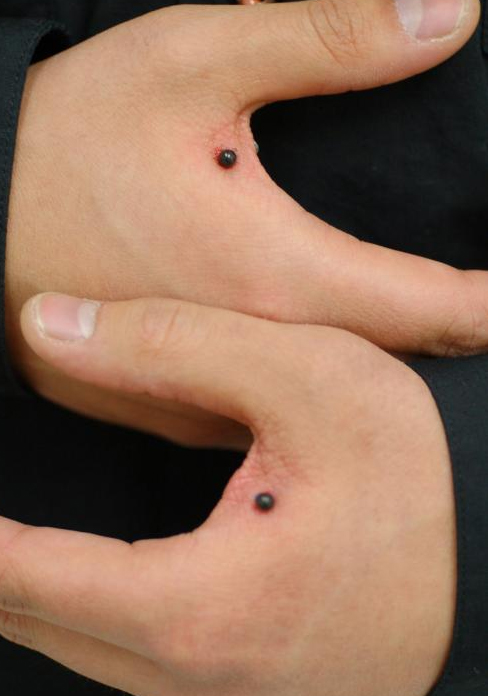 Hand Web Piercings | Web Piercing Pictures on Painfulpleasures.com 