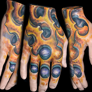 A Pound of Flesh Hand Tattoo by Brandon Schultheis