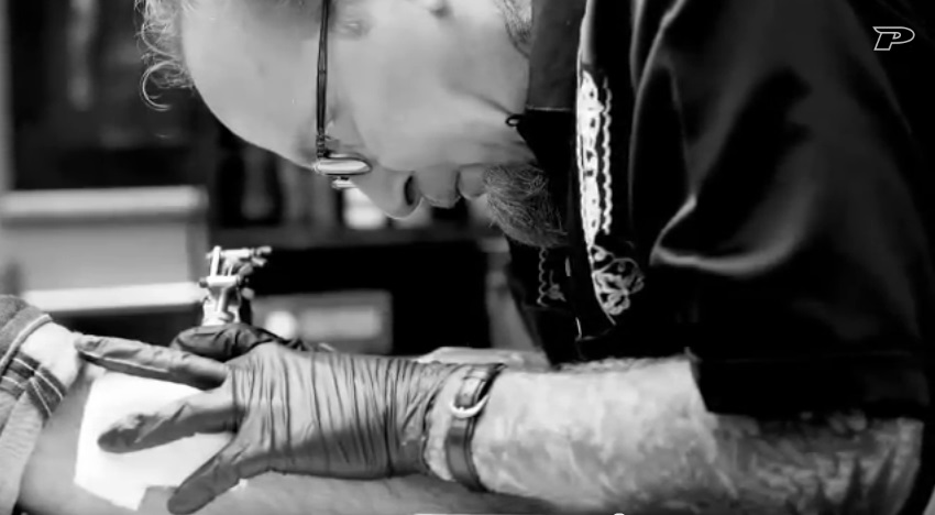 Tattoo Artist Bill Salmon at Work Tattooing 