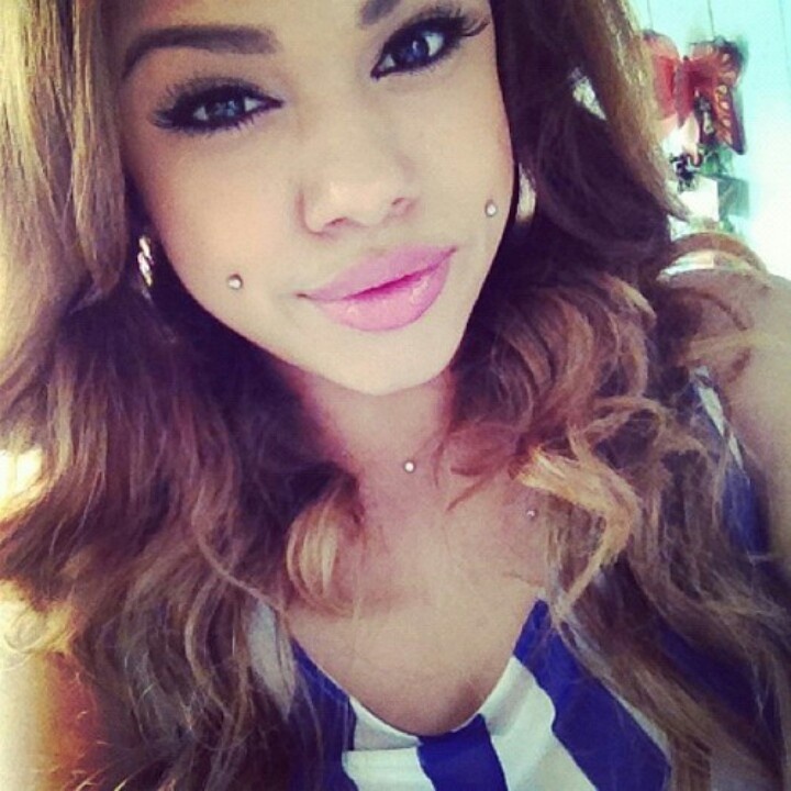 Girl With Cheek Piercings 