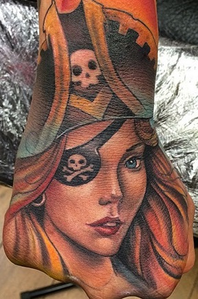 Girl Pirate Hand and Forearm Tattoo by Bez of Triplesix Studios 