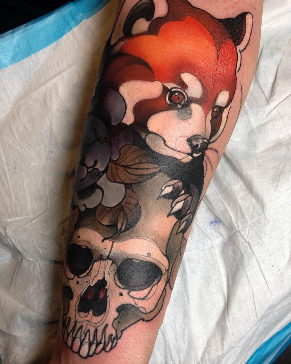 Neotraditional red panda with skull tattoo by Gia Rose