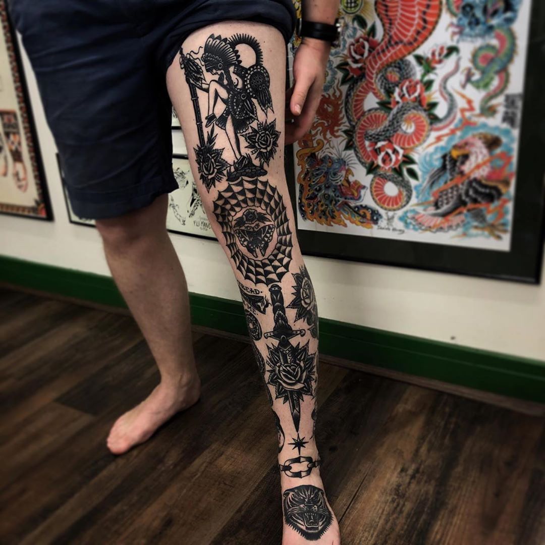 Blackwork tattoos as a full leg sleeve