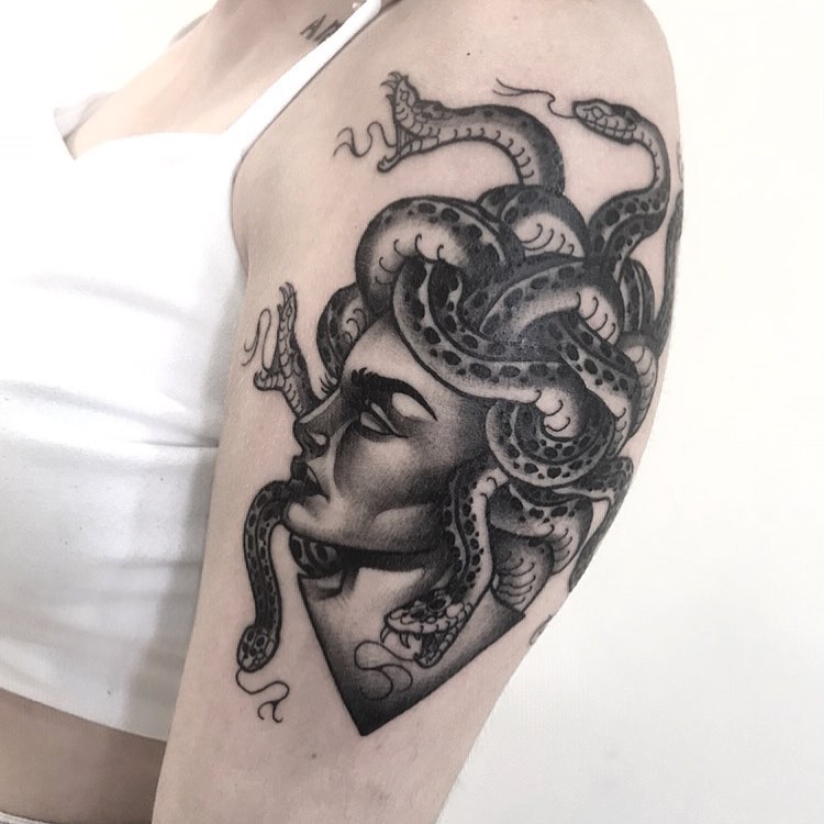 Tattoo of Medusa with snake hair in black and grey