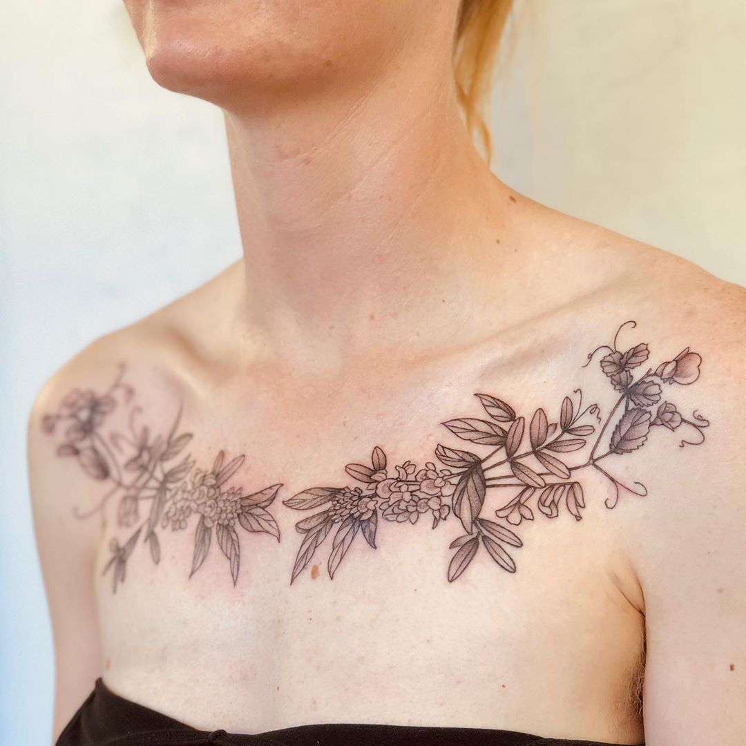 Floral chest panel tattoo