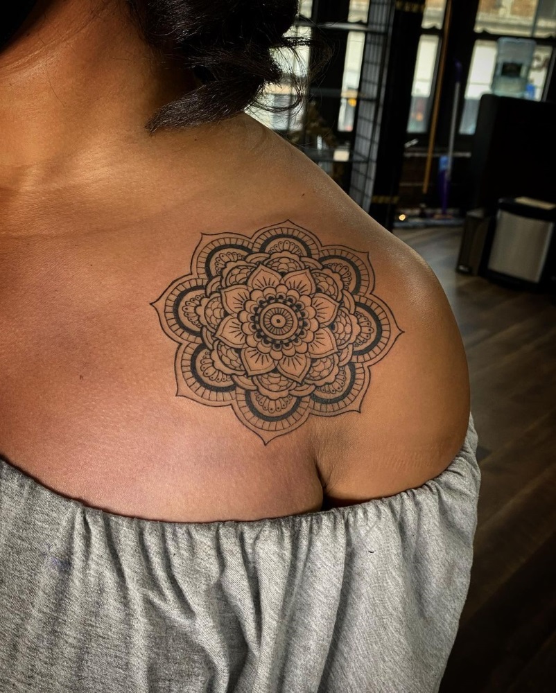 Black and grey mandala tattoo by tattoo artist Mandy Fabrizi