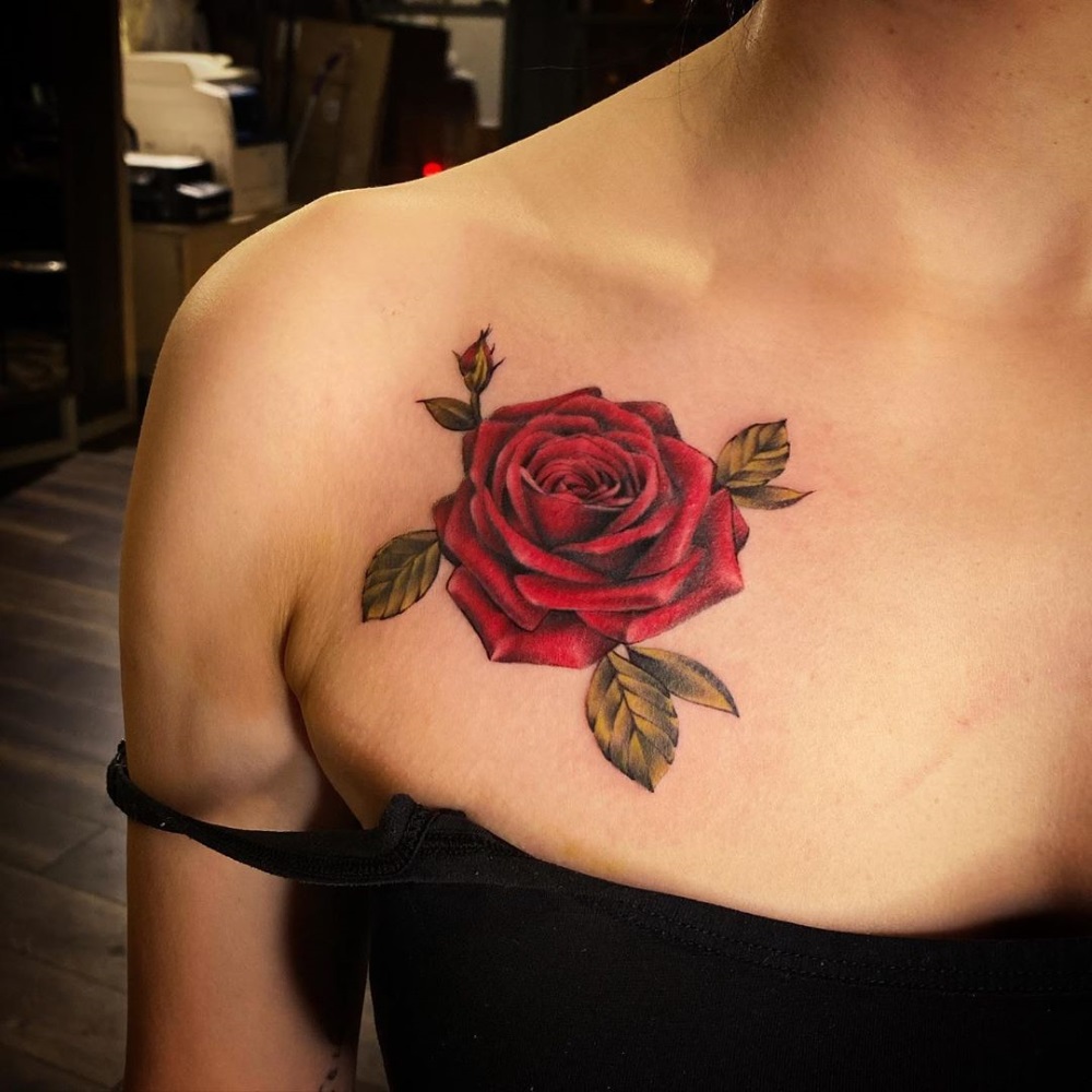Red rose tattoo by tattoo artist Mandy Fabrizi