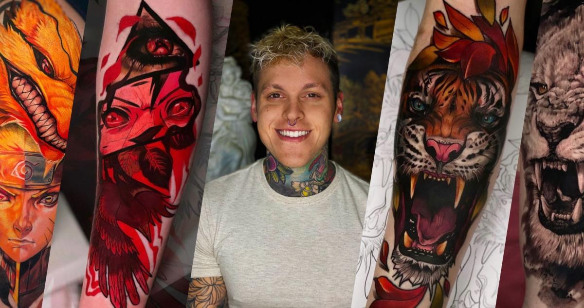 Tattoo artist Brett Bloom framed by his bold, colorful tattoos