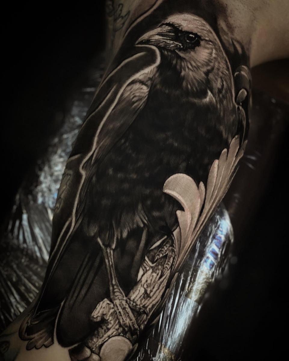 Raven tattoo by tattoo artist Bret Bloom