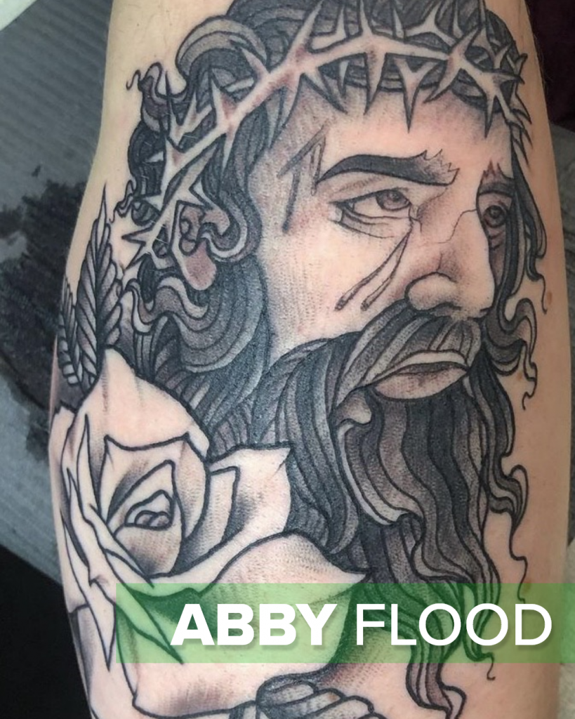 Jesus tattoo by lesbian and non-binary tattoo artist, Abby Flood