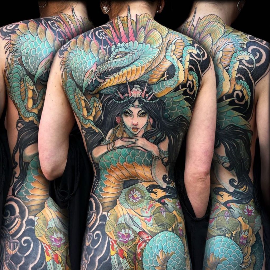 Tattoo client with full back panel tattoo in Japanese Traditional style