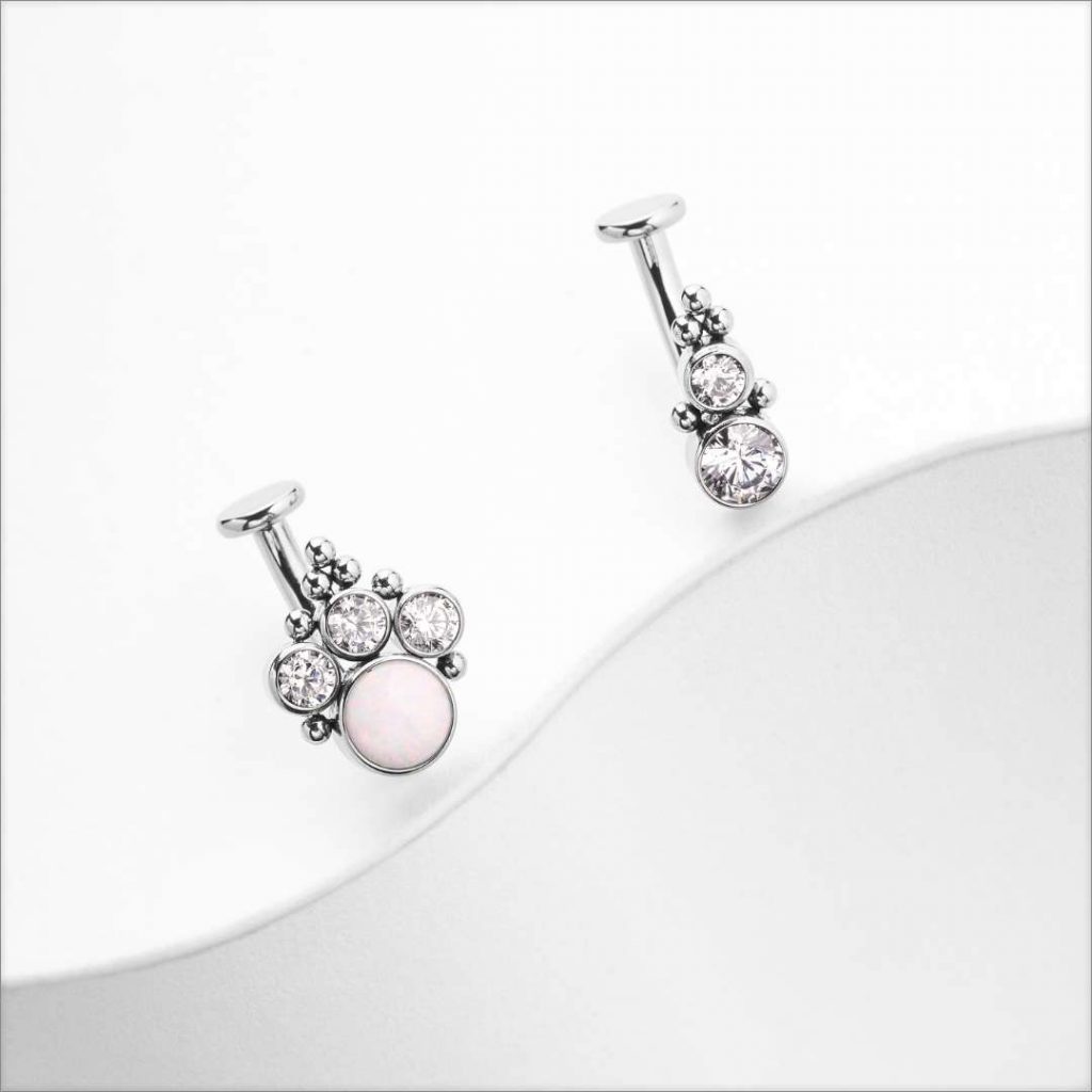 Titanium belly button rings with white opals and jewels