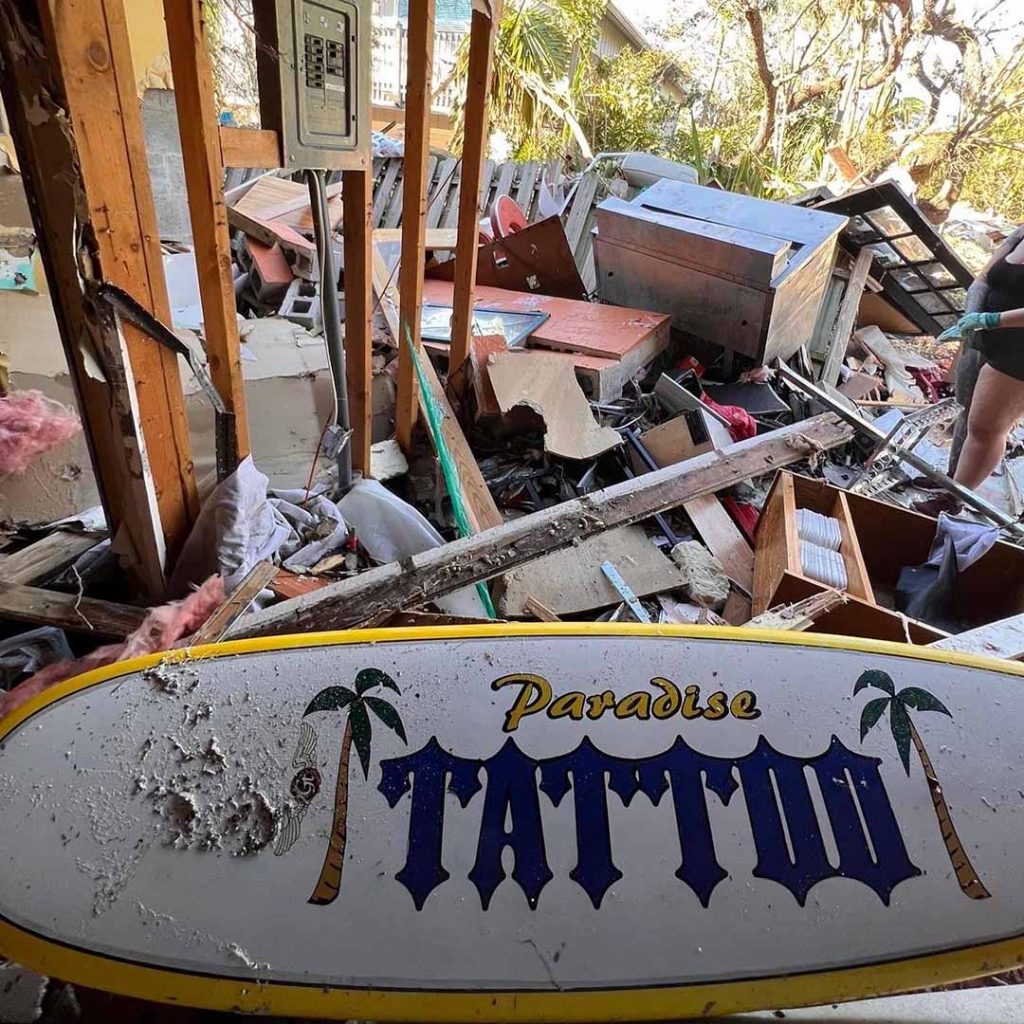 Remains of a tattoo shop after the effects of Hurricane Ian